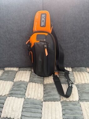 TUMI means Sling Mclaren Edition. Only used once